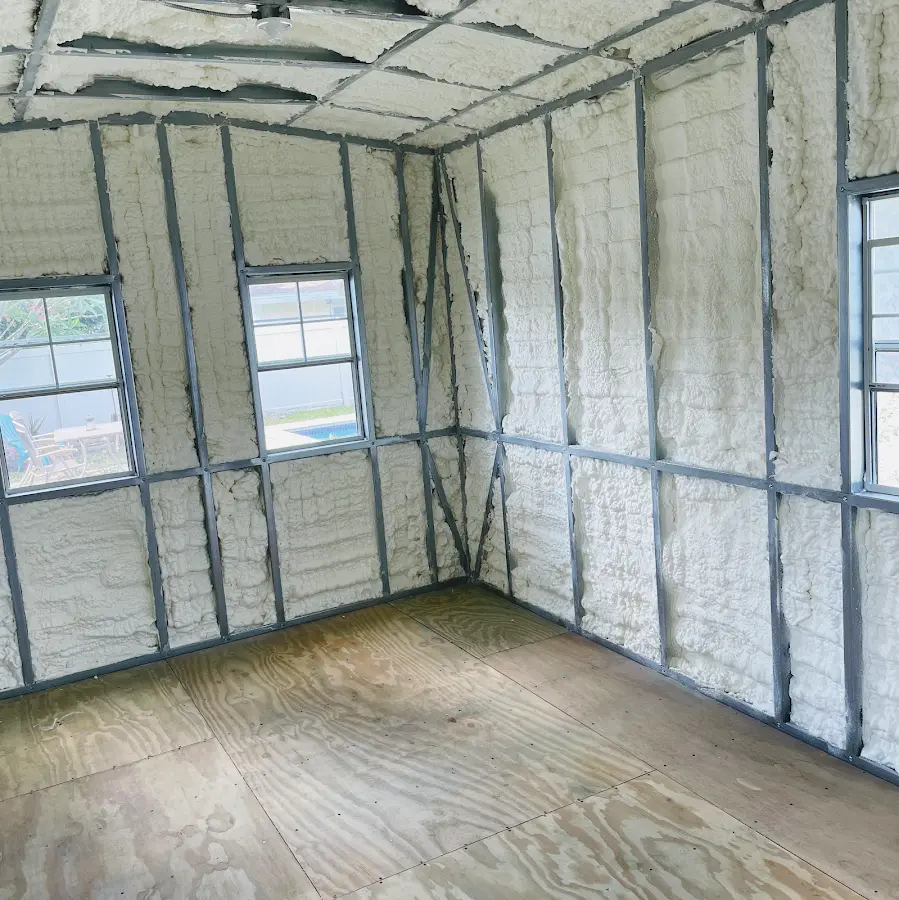 Closed-cell spray foam insulation applied to wall cavities in a residential project in Whitestown